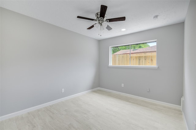 4614 Wee Lassie Ln, Houston, TX 77084 - spare room with ceiling fan, baseboards, wood finished floors, and recessed lighting