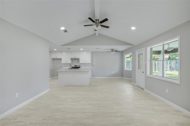4614 Wee Lassie Ln, Houston, TX 77084 - unfurnished living room with a ceiling fan, light wood-style floors, baseboards, and recessed lighting