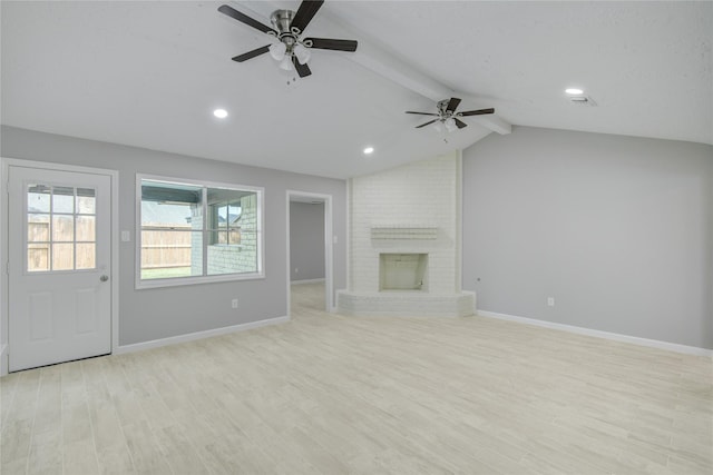 4614 Wee Lassie Ln, Houston, TX 77084 - unfurnished living room featuring ceiling fan, baseboards, light wood-style floors, a fireplace, and recessed lighting