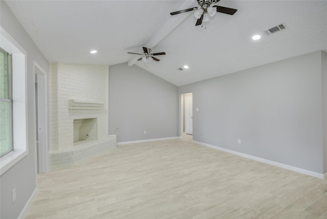 4614 Wee Lassie Ln, Houston, TX 77084 - unfurnished living room featuring ceiling fan, light wood-style flooring, baseboards, a fireplace, and recessed lighting
