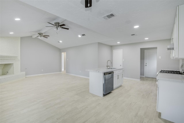 4614 Wee Lassie Ln, Houston, TX 77084 - kitchen featuring stainless steel dishwasher, a ceiling fan, white cabinetry, baseboards, and a center island with sink