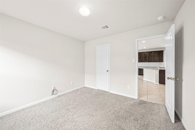 29618 Juntti Park Ct, Katy, TX 77494 - unfurnished bedroom with light colored carpet and baseboards