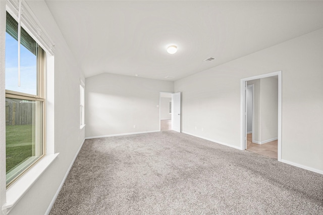 29618 Juntti Park Ct, Katy, TX 77494 - spare room featuring carpet, baseboards, and vaulted ceiling
