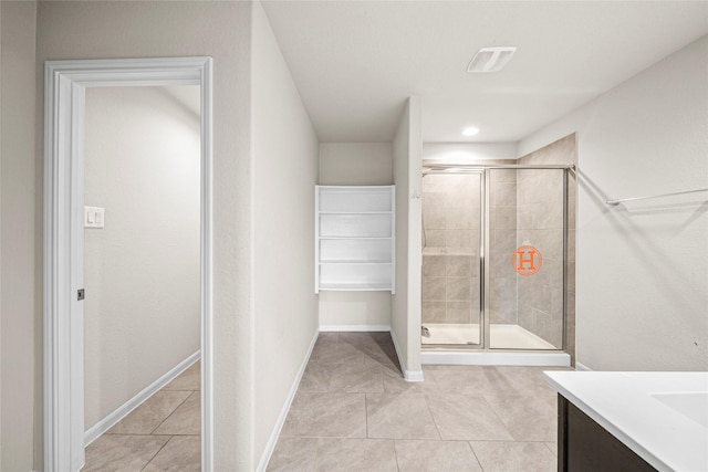 29618 Juntti Park Ct, Katy, TX 77494 - full bathroom with tile patterned flooring, a stall shower, vanity, baseboards, and recessed lighting