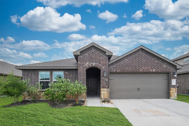 29618 Juntti Park Ct, Katy, TX 77494 - view of front facade with brick siding, an attached garage, driveway, a front yard, and a shingled roof