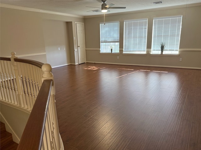 4415 April Meadow Way, Sugar Land, TX 77479 - spare room with ceiling fan, dark wood-style flooring, and crown molding