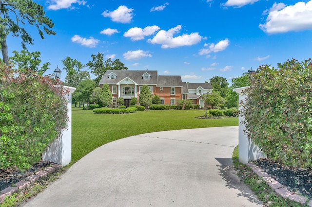15203 Wildwood Cir, Magnolia, TX 77354 - view of front of house featuring a front lawn