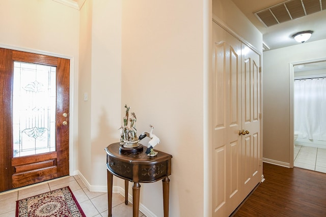 16211 Fleethaven Ln, Houston, TX 77084 - tiled foyer entrance featuring baseboards