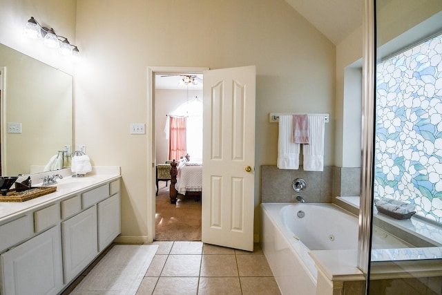 16211 Fleethaven Ln, Houston, TX 77084 - full bath with tile patterned flooring, vanity, a whirlpool tub, ceiling fan, and lofted ceiling