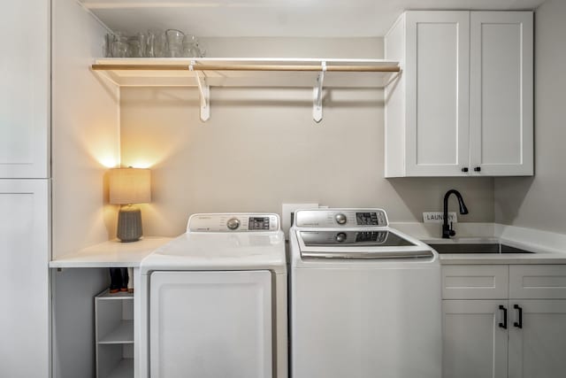 6111 Knollview Dr, Spring, TX 77389 - laundry area featuring cabinet space and washer and clothes dryer