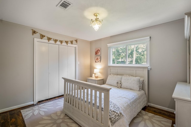 6111 Knollview Dr, Spring, TX 77389 - bedroom with baseboards, wood finished floors, a closet, and crown molding