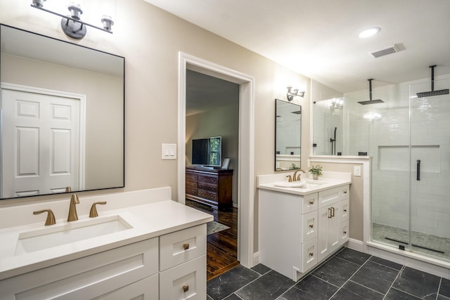 6111 Knollview Dr, Spring, TX 77389 - full bathroom with a shower stall and two vanities