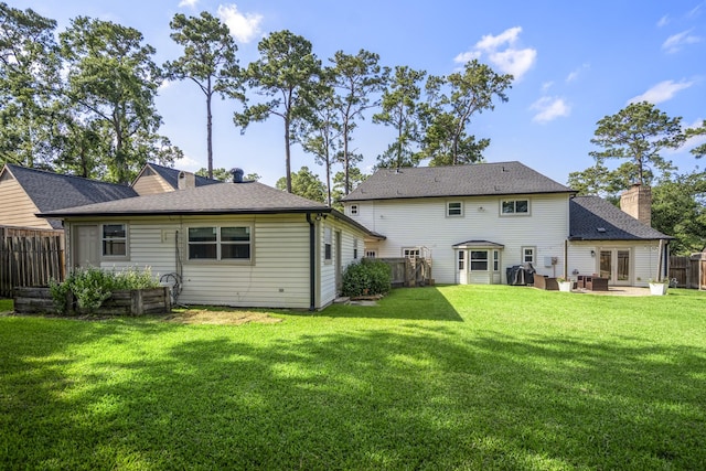 6111 Knollview Dr, Spring, TX 77389 - rear view of property with a chimney and a patio area