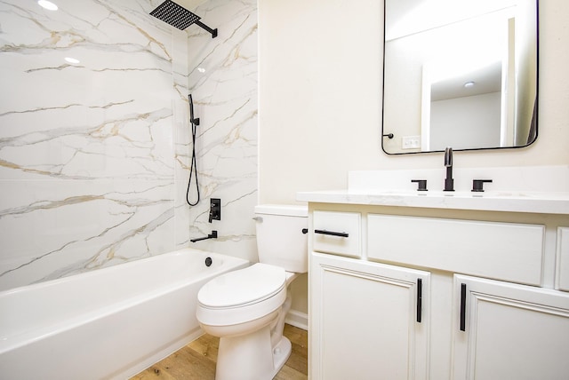 7227 La Granada Dr, Houston, TX 77083 - full bath with toilet, wood finished floors, vanity, and shower / bath combination