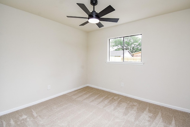7227 La Granada Dr, Houston, TX 77083 - spare room featuring light carpet, baseboards, and a ceiling fan