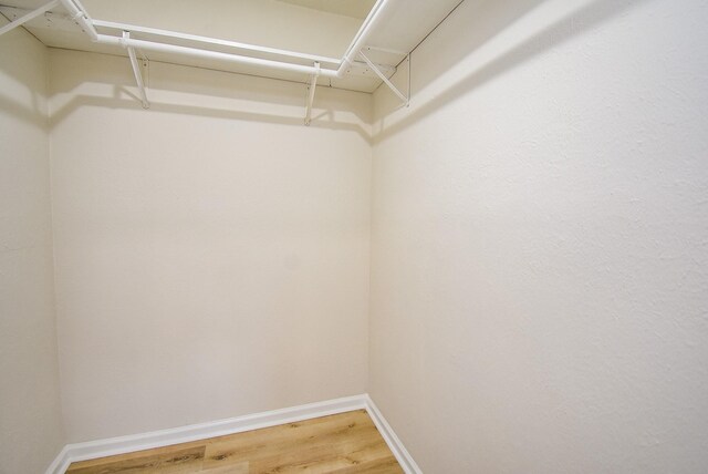 7227 La Granada Dr, Houston, TX 77083 - walk in closet featuring light wood-style floors