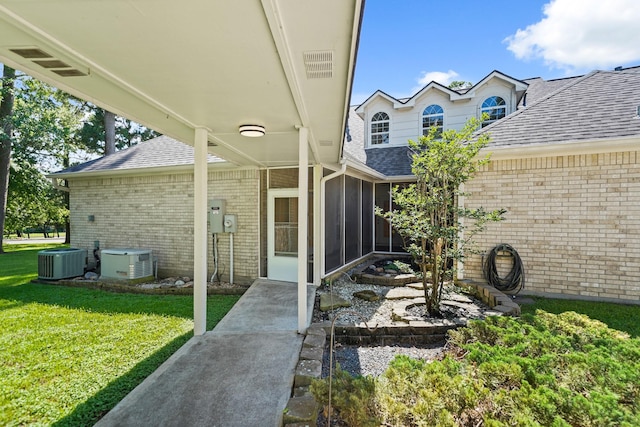 12690 Longmire Way, Conroe, TX 77304 - view of patio / terrace featuring a sunroom and central AC
