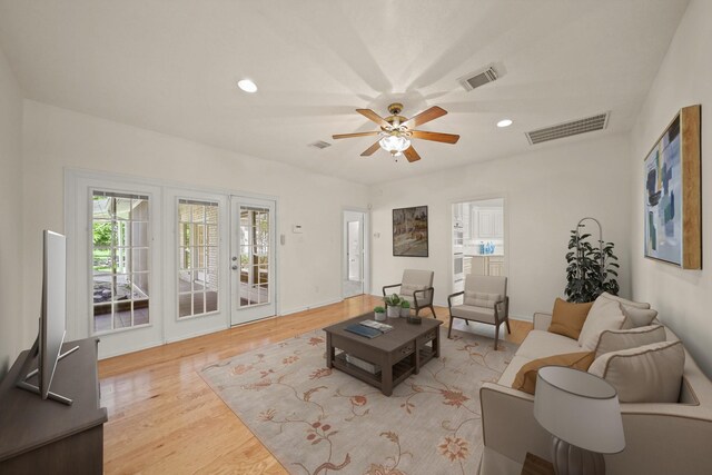 12690 Longmire Way, Conroe, TX 77304 - living room with ceiling fan, light wood-style flooring, and recessed lighting