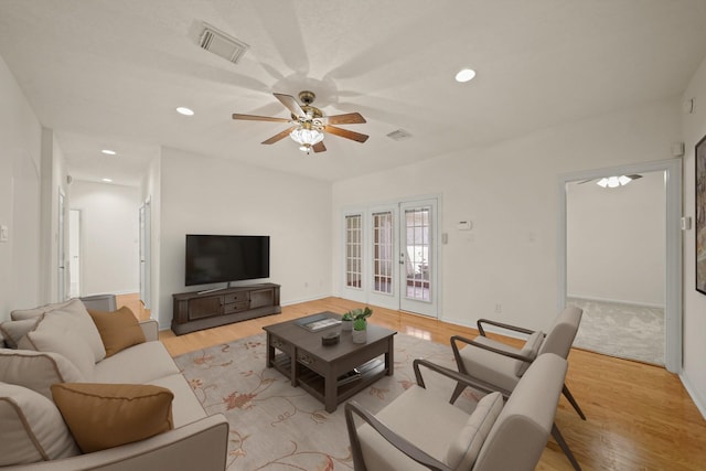 12690 Longmire Way, Conroe, TX 77304 - living area with a ceiling fan, light wood finished floors, french doors, baseboards, and recessed lighting