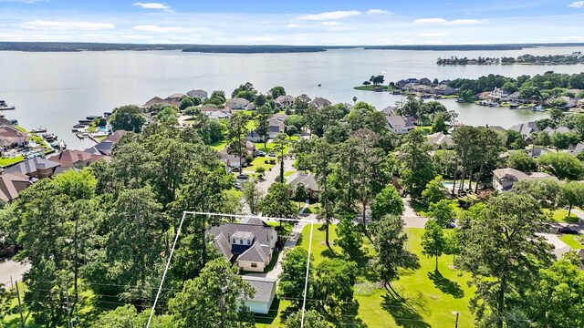 12690 Longmire Way, Conroe, TX 77304 - aerial view of residential area featuring property boundaries highlighted and a nearby body of water