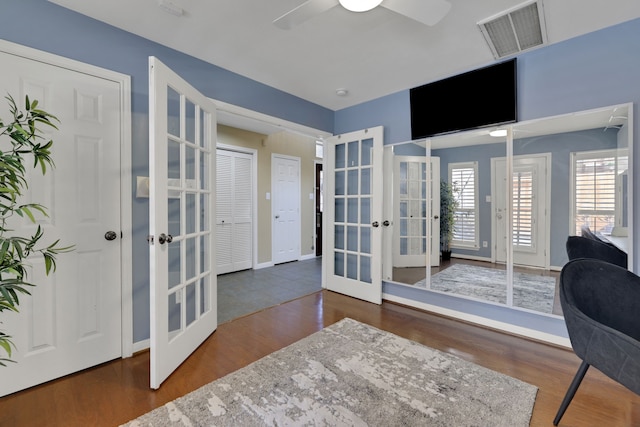 2416 Charleston St Unit E, Houston, TX 77021 - home office with french doors, wood finished floors, healthy amount of natural light, and ceiling fan