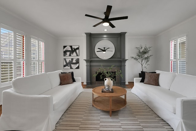 2416 Charleston St Unit E, Houston, TX 77021 - living area with healthy amount of natural light, ceiling fan, ornamental molding, and wood finished floors
