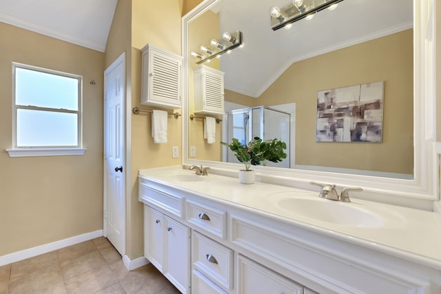 2416 Charleston St Unit E, Houston, TX 77021 - full bathroom featuring lofted ceiling, crown molding, a shower stall, double vanity, and baseboards