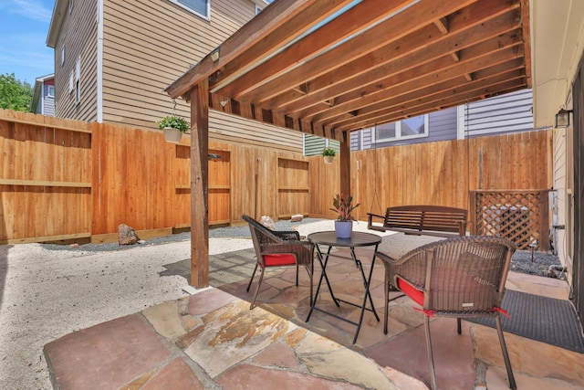 2416 Charleston St Unit E, Houston, TX 77021 - fenced backyard featuring outdoor dining space and a patio