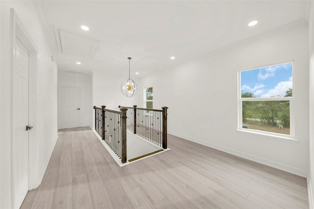 6037 S Acres Dr, Houston, TX 77048 - hallway with attic access, baseboards, light wood-type flooring, and recessed lighting