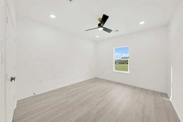 6037 S Acres Dr, Houston, TX 77048 - empty room with light wood-style floors, a ceiling fan, recessed lighting, and baseboards