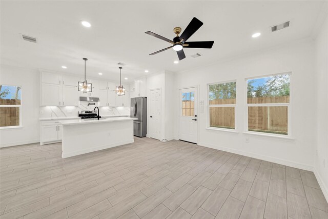 6037 S Acres Dr, Houston, TX 77048 - kitchen with appliances with stainless steel finishes, light countertops, recessed lighting, tasteful backsplash, and ceiling fan