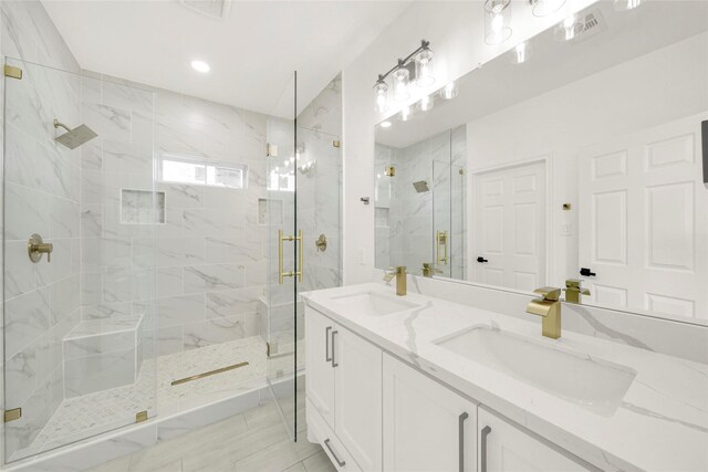 6037 S Acres Dr, Houston, TX 77048 - full bath with a stall shower, double vanity, and recessed lighting
