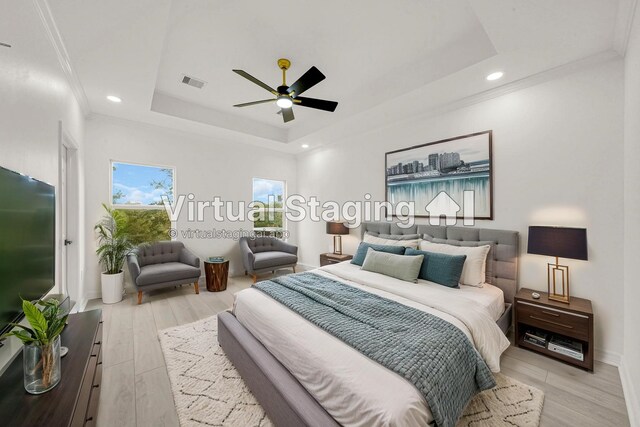 6037 S Acres Dr, Houston, TX 77048 - bedroom featuring a raised ceiling, light wood-style floors, a ceiling fan, ornamental molding, and recessed lighting