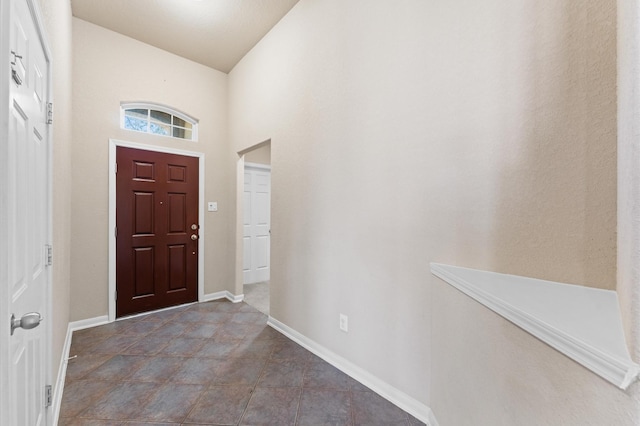 7303 Enchanted Rock Ln, Missouri City, TX 77459 - entryway with baseboards and a high ceiling