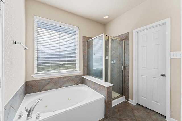 7303 Enchanted Rock Ln, Missouri City, TX 77459 - bathroom with a shower stall, a whirlpool tub, and tile patterned floors