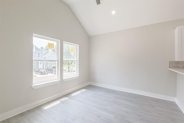 16984 W Dounreay, Montgomery, TX 77316 - unfurnished room featuring light wood-style flooring, vaulted ceiling, baseboards, and recessed lighting