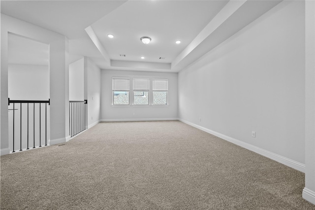 4325 Victoria Pine Dr, Spring, TX 77386 - carpeted spare room featuring a raised ceiling, recessed lighting, and baseboards