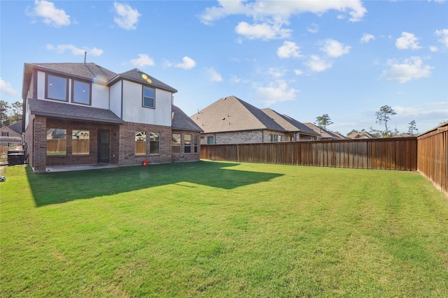 4325 Victoria Pine Dr, Spring, TX 77386 - back of property with a shingled roof and brick siding