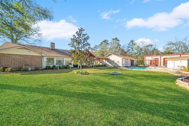 96 Fm 2550th Rd, Huntsville, TX 77320 - view of green lawn featuring an outdoor pool, a patio, and an outdoor structure