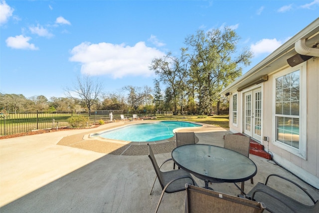 96 Fm 2550th Rd, Huntsville, TX 77320 - view of pool featuring french doors, a patio, and fence