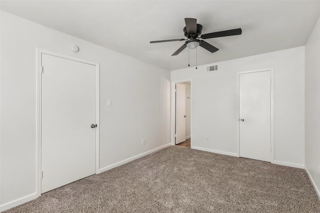 5524 Beverlyhill St Unit 4, Houston, TX 77056 - unfurnished bedroom featuring carpet flooring, baseboards, and a ceiling fan