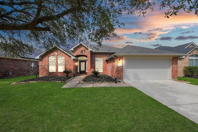 15122 Heron Meadow Ln, Cypress, TX 77429 - view of front facade featuring a garage, concrete driveway, a lawn, brick siding, and roof with shingles