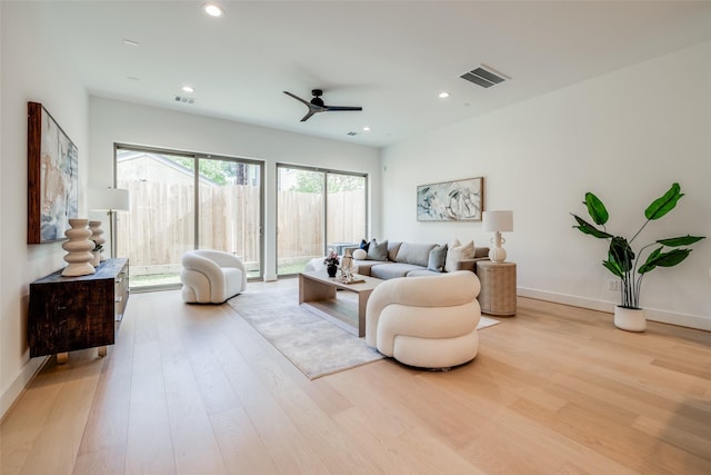 1209 W Bell St, Houston, TX 77019 - living area with wood finished floors, ceiling fan, recessed lighting, and baseboards