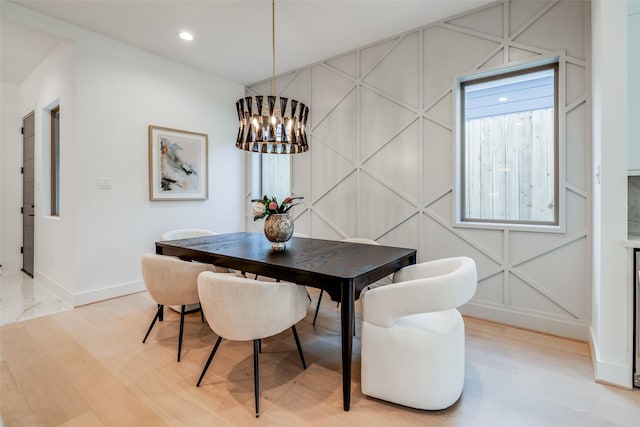 1209 W Bell St, Houston, TX 77019 - dining room with baseboards, a chandelier, light wood-style floors, and recessed lighting