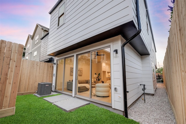 1209 W Bell St, Houston, TX 77019 - back of property at dusk with cooling unit
