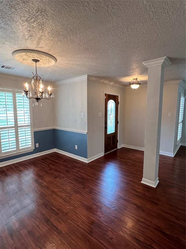 4326 Holly Terrace Ct, Pasadena, TX 77505 - entryway featuring a textured ceiling, wood finished floors, a chandelier, crown molding, and baseboards