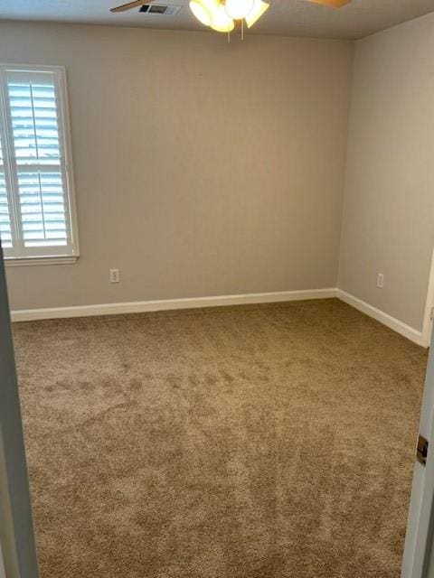 4326 Holly Terrace Ct, Pasadena, TX 77505 - carpeted spare room featuring a ceiling fan and baseboards