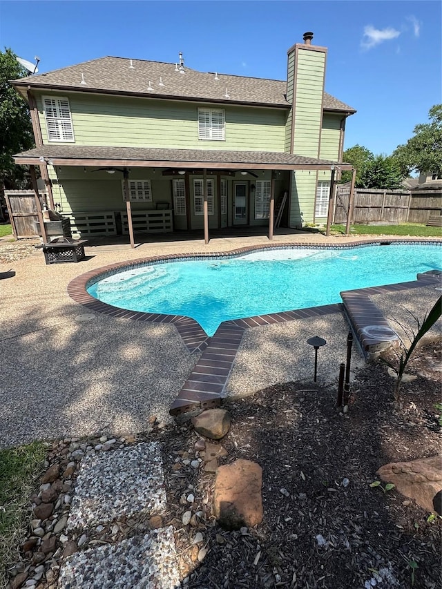 4326 Holly Terrace Ct, Pasadena, TX 77505 - view of swimming pool featuring a patio and fence