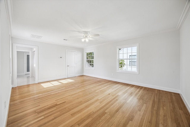 2518 Glen Haven Blvd, Houston, TX 77030 - unfurnished room with ornamental molding, light wood finished floors, ceiling fan, and baseboards