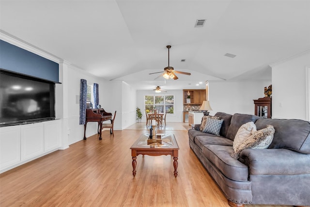 606 Packer Ct, Webster, TX 77598 - living room featuring a ceiling fan, light wood-style flooring, and vaulted ceiling